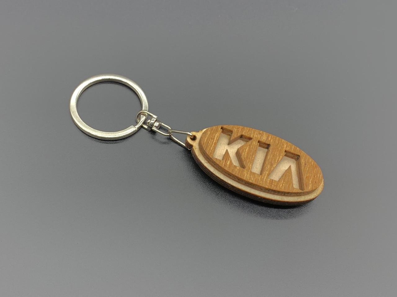 Брелок автомобильный деревянный с маркой Kia 5х2 см Светло-коричневый (925527601) Брелок автомобильный деревянный с маркой Kia 5х2 см Светло-коричневый (925527601)