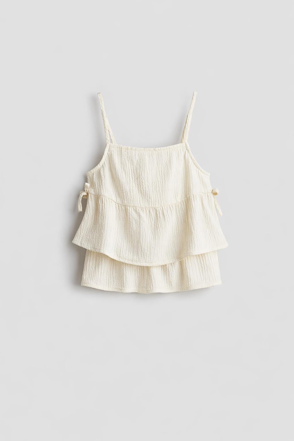 Топ H&M 1269479 140 см Молочний