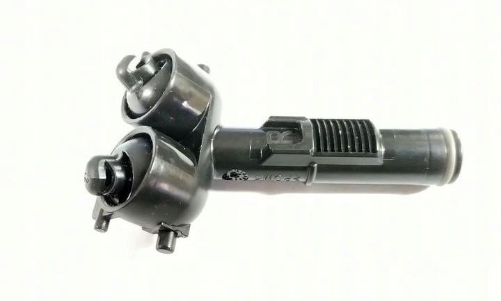 Форсунка омивача фар Skoda Fabia/Roomster '07-10 права (5J0955104)