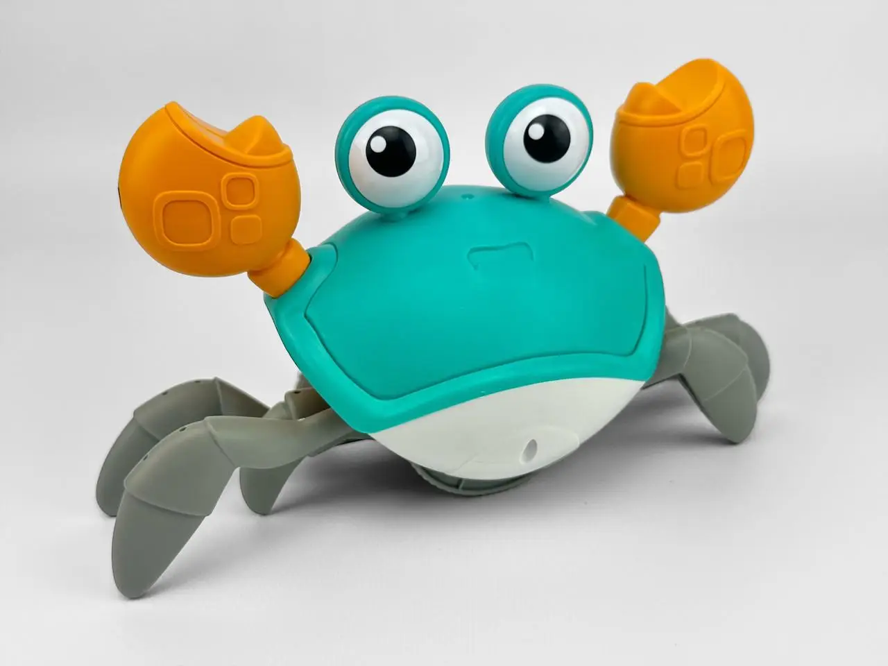 Развивающая игрушка QC 3 Y Краб бегает музыкальный со встроенным сенсором (QC 3-1 Y)