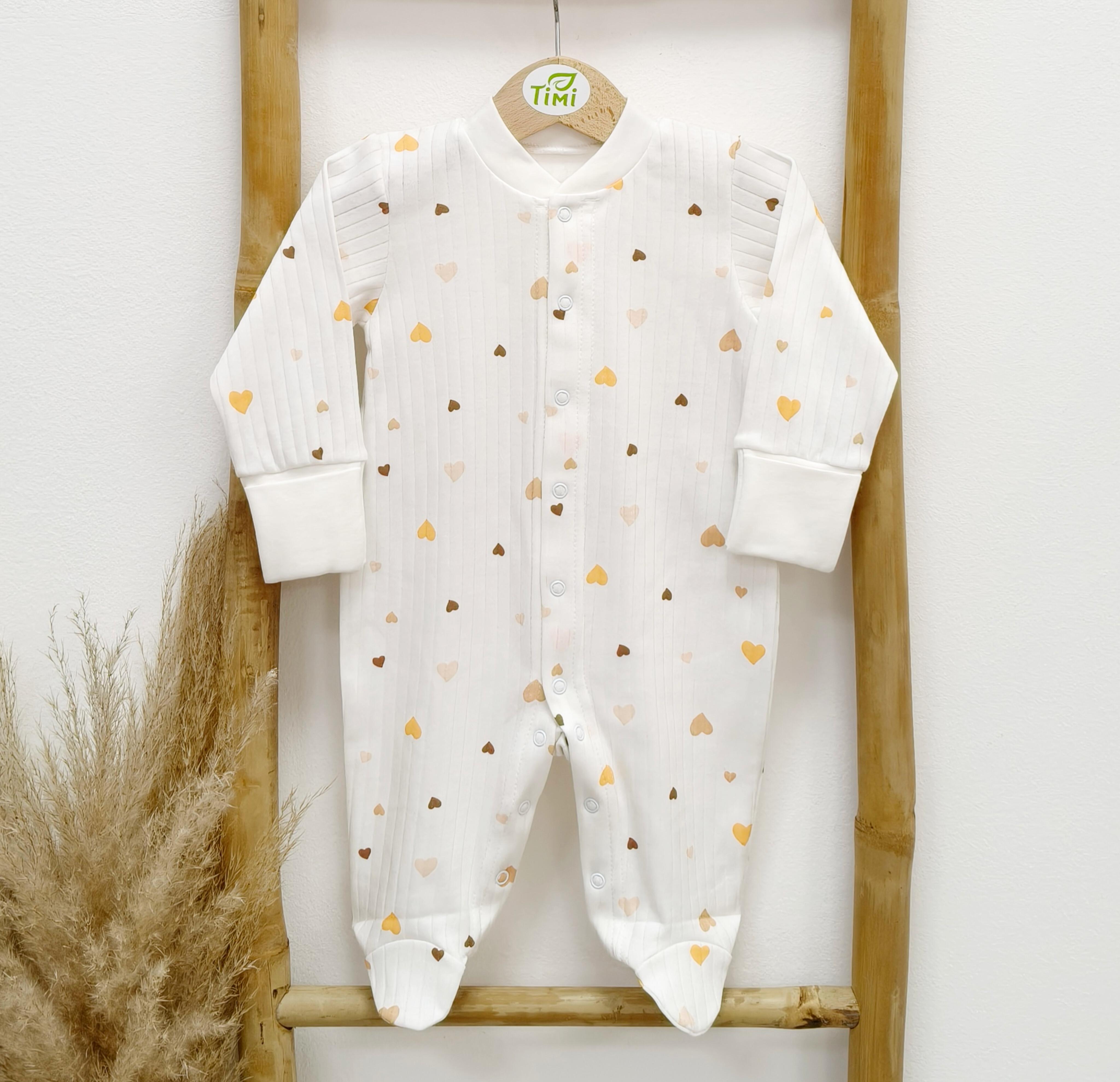 Чоловічок з закритими ручками в рубчик Тімі текс Помаранчеві сердечка 56 см Молочний