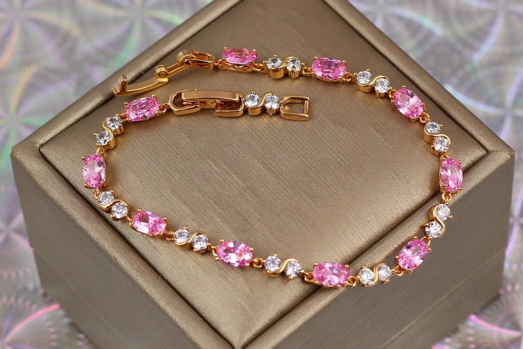 Браслет Xuping Jewelry волна с розовыми камнями 19 см 4 мм. Золотистый