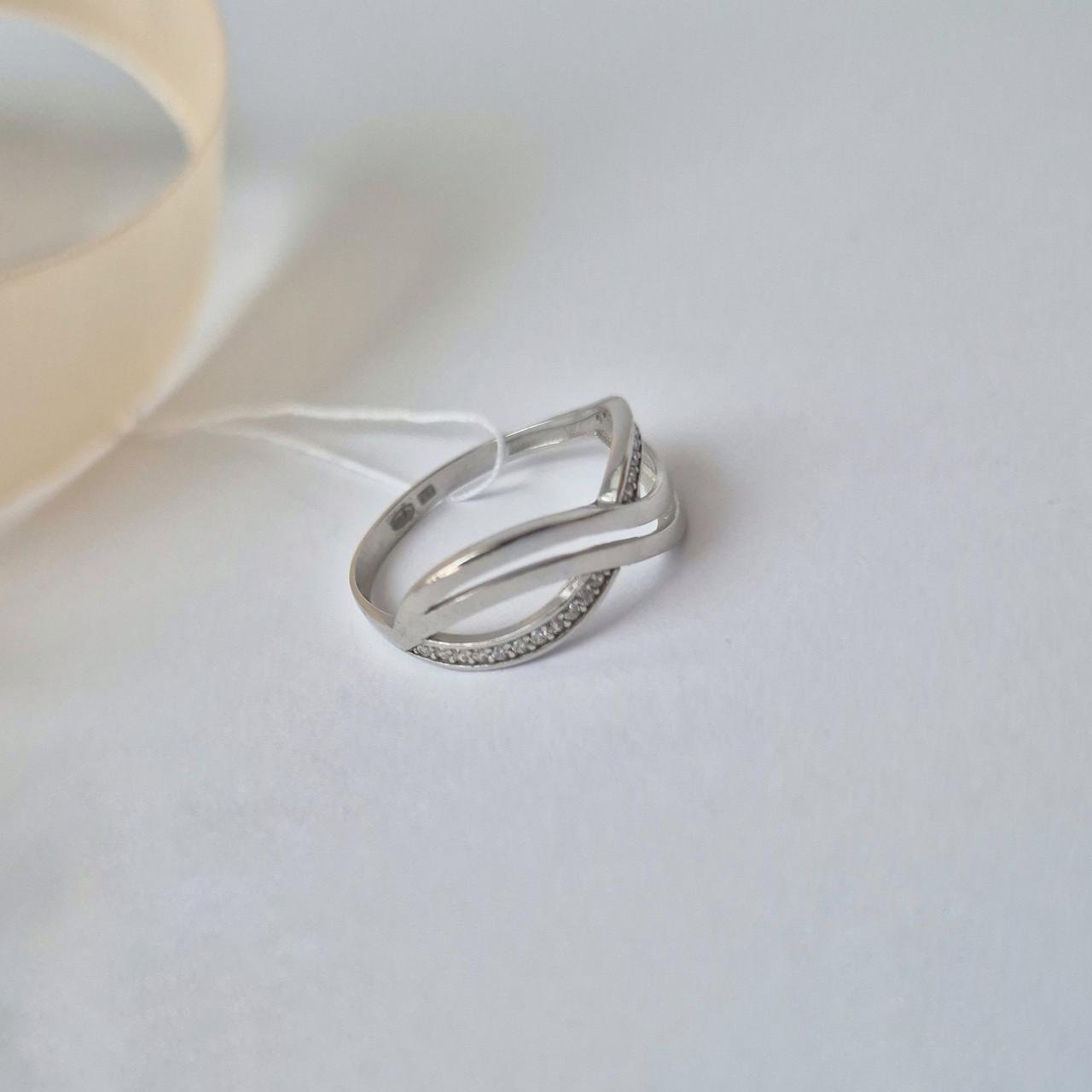Каблучка з білими каменями нескінченність срібло 925 проби родоване р. 19.0 - фото 2 Каблучка з білими каменями нескінченність срібло 925 проби родоване р. 19.0 - фото 2