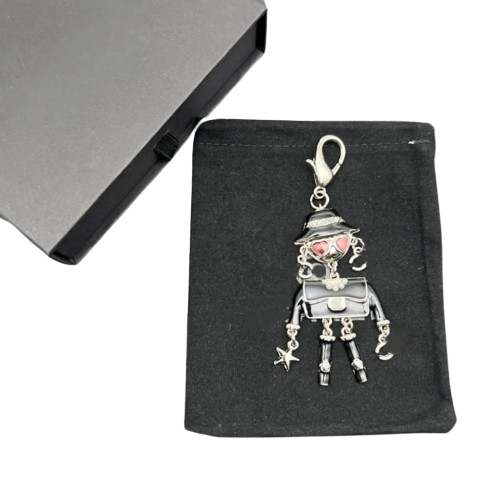 Брелок-подвеска дизайнерская Chanel Кукла в очках Black/Silver