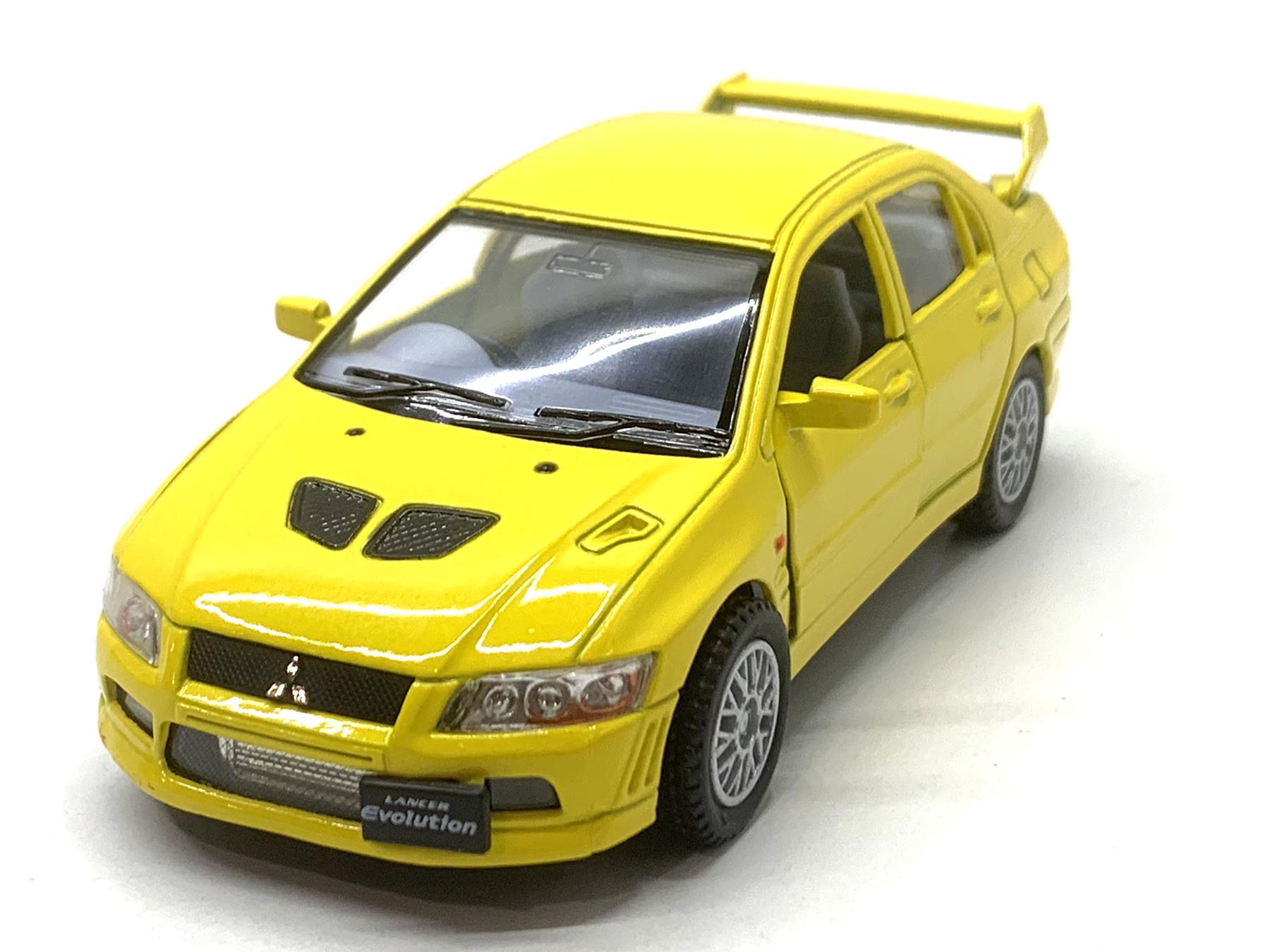 Машинка Kinsmart Mitsubishi Lancer Evolution VII металлическая Желтый (KT5052W)