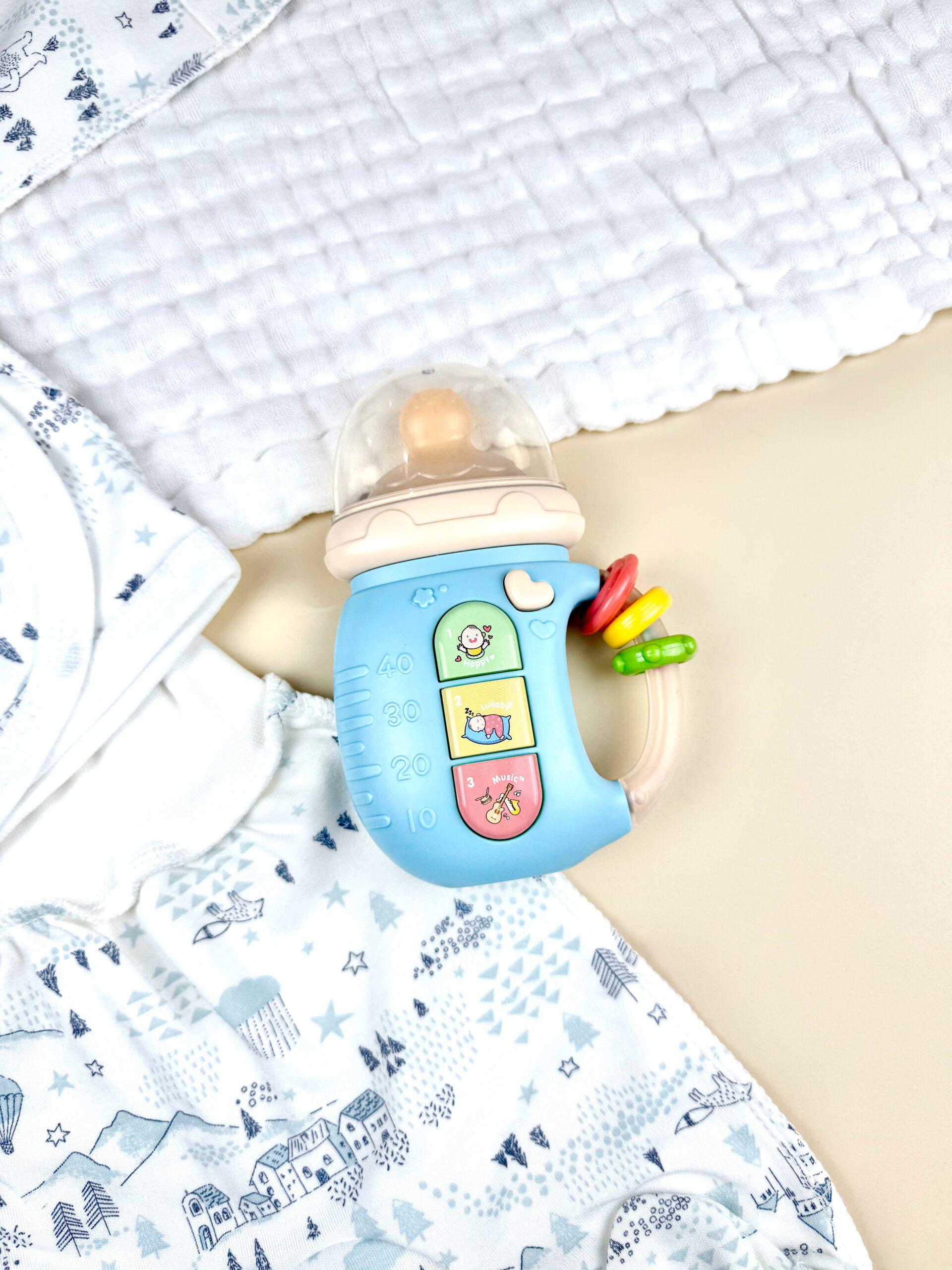 Игрушка развивающая музыкальная бутылочка-телефон 5в1 Голубой (10187) - фото 13 Игрушка развивающая музыкальная бутылочка-телефон 5в1 Голубой (10187) - фото 13