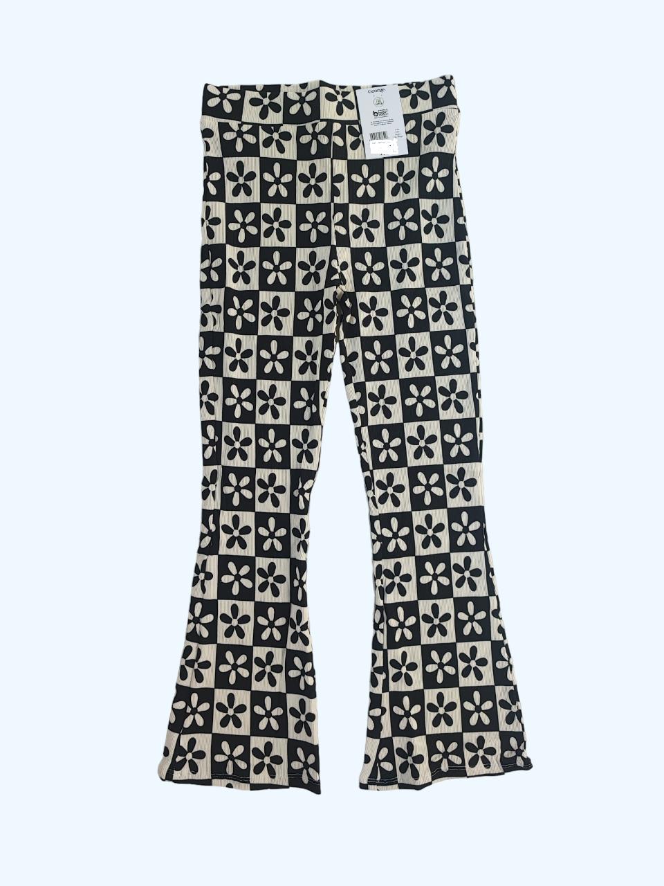 Штани дитячі кльош для дівчинки George 135 см Чорний з білим (0201) Штани дитячі кльош для дівчинки George 135 см Чорний з білим (0201)