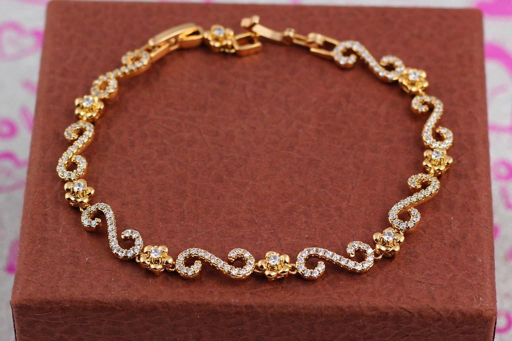Браслет Xuping Jewelry Цветочный завиток 19,5 см Золотистый