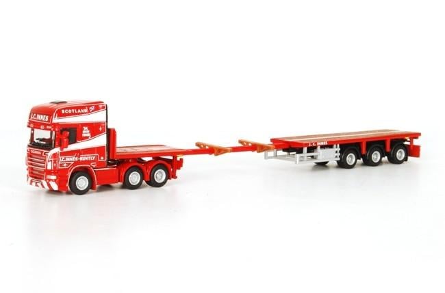 Игрушка Тягач SCANIA с низкорамным прицепом 1:87