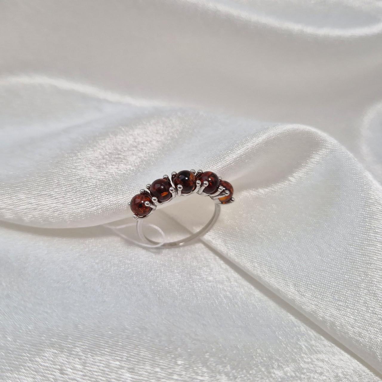 Каблучка доріжка із бурштином срібло 925 проби родоване 1,95 г р. 18,5 (895к)